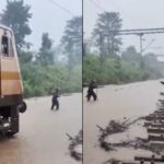 आगे लाल झंडी लेकर चला रेलकर्मी, पीछे 3 फीट पानी चीरती रही ट्रेन; सतना-मानिकपुर ट्रैक का VIDEO वायरल